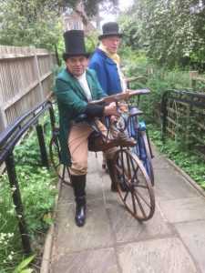 The Dandy Chargers on their velocipedes at the Fourth Bicentennial John Keats Conference