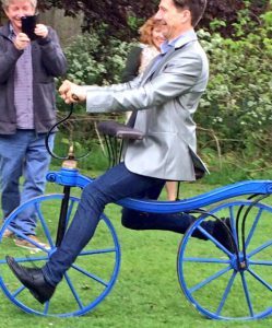Learning to ride a Regency velocipede at the Fourth Bicentennial John Keats Conference